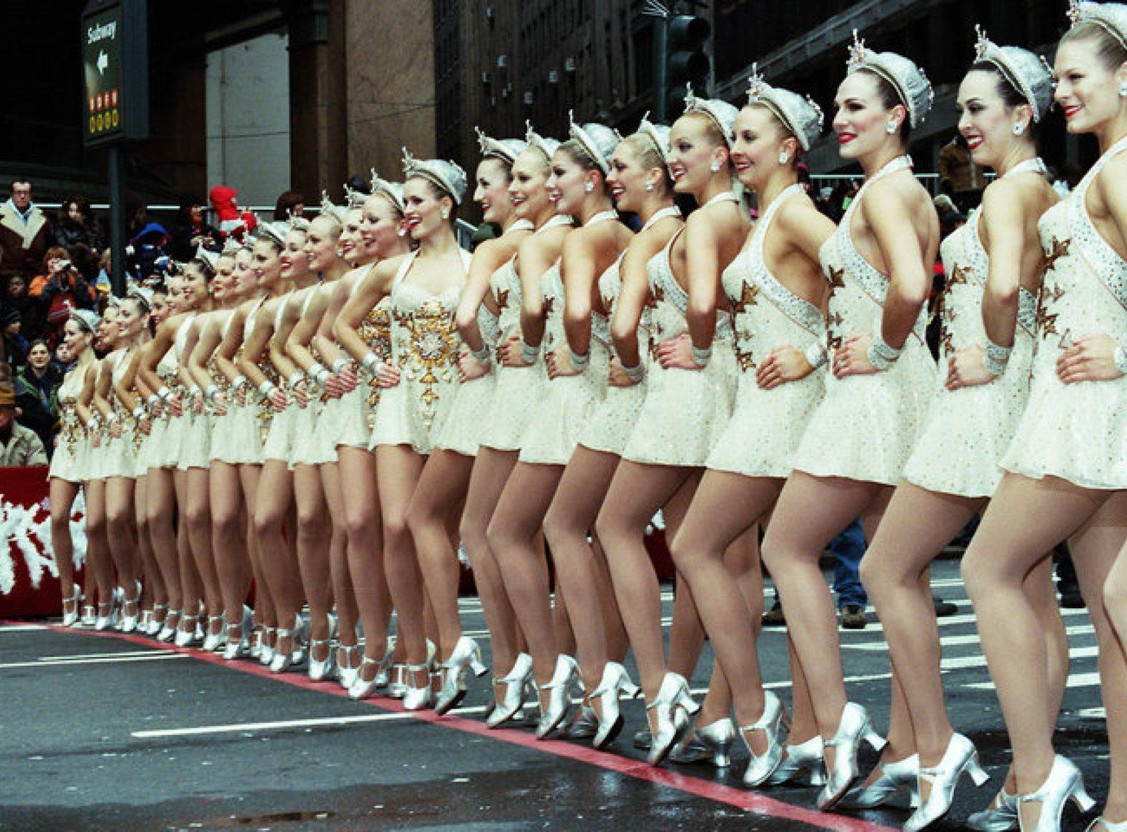 The Radio City Rockettes performing the famous kick line at the Macy's Thanksgiving Day Parade